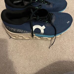 On Running Navy and Black Sneakers